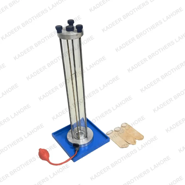 Balloon Density Apparatus, featuring a transparent cylinder, a blue base with a power cord, and three sample balloons positioned beside it, used for conducting density measurements in laboratory experiments.