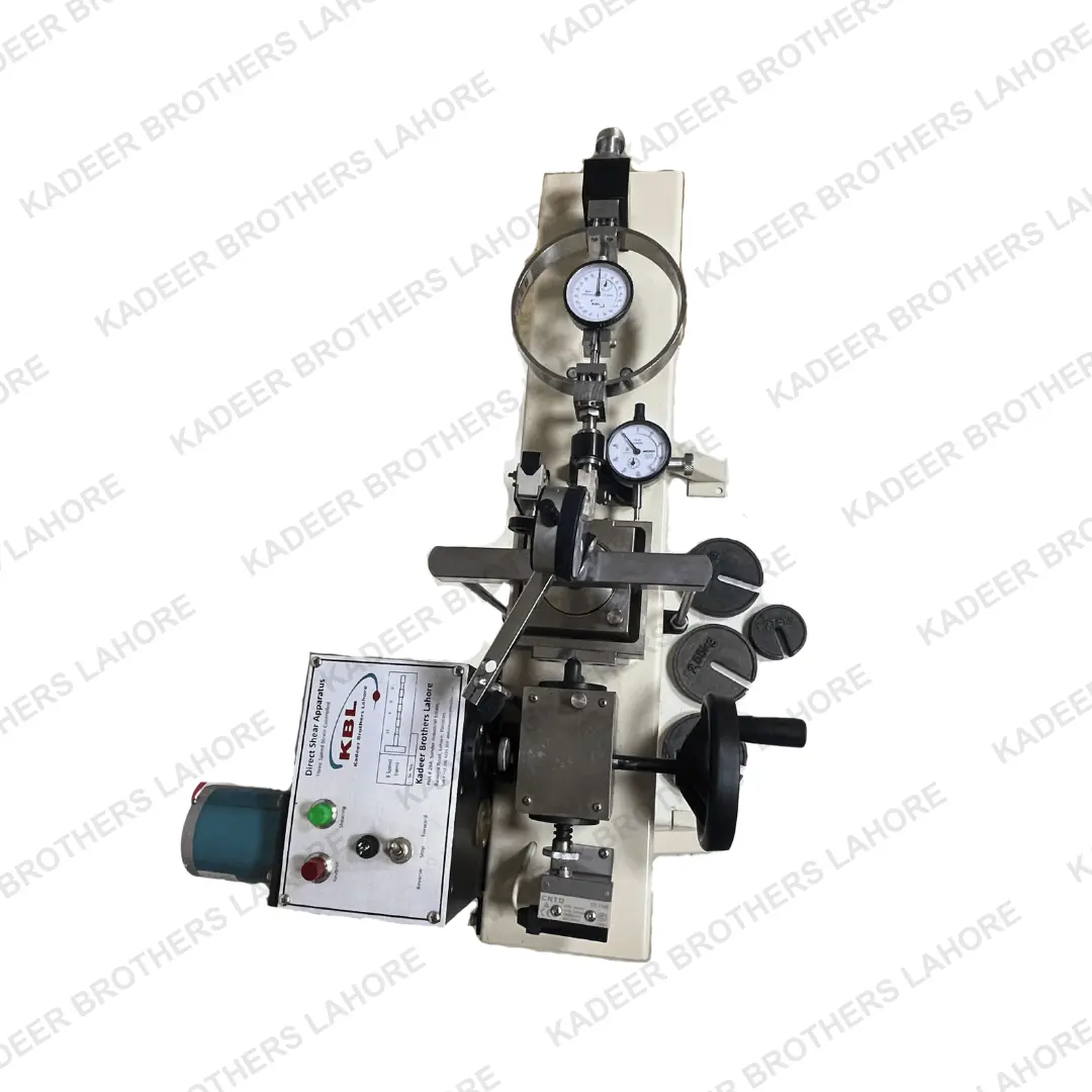 A detailed look at the motorized direct shear apparatus, displaying the shear box, loading mechanism, and measurement instruments for evaluating soil shear strength.